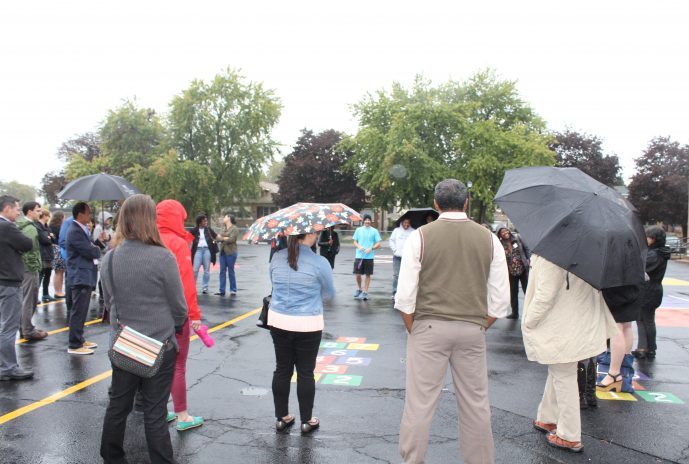 Participants looking at the Active Recess Paintings