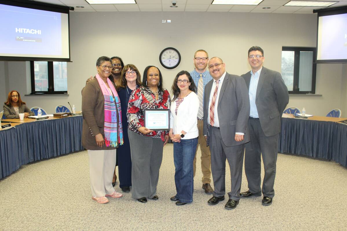 Tracy Sykes Honored at April Board Meeting