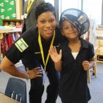 student visits with officer